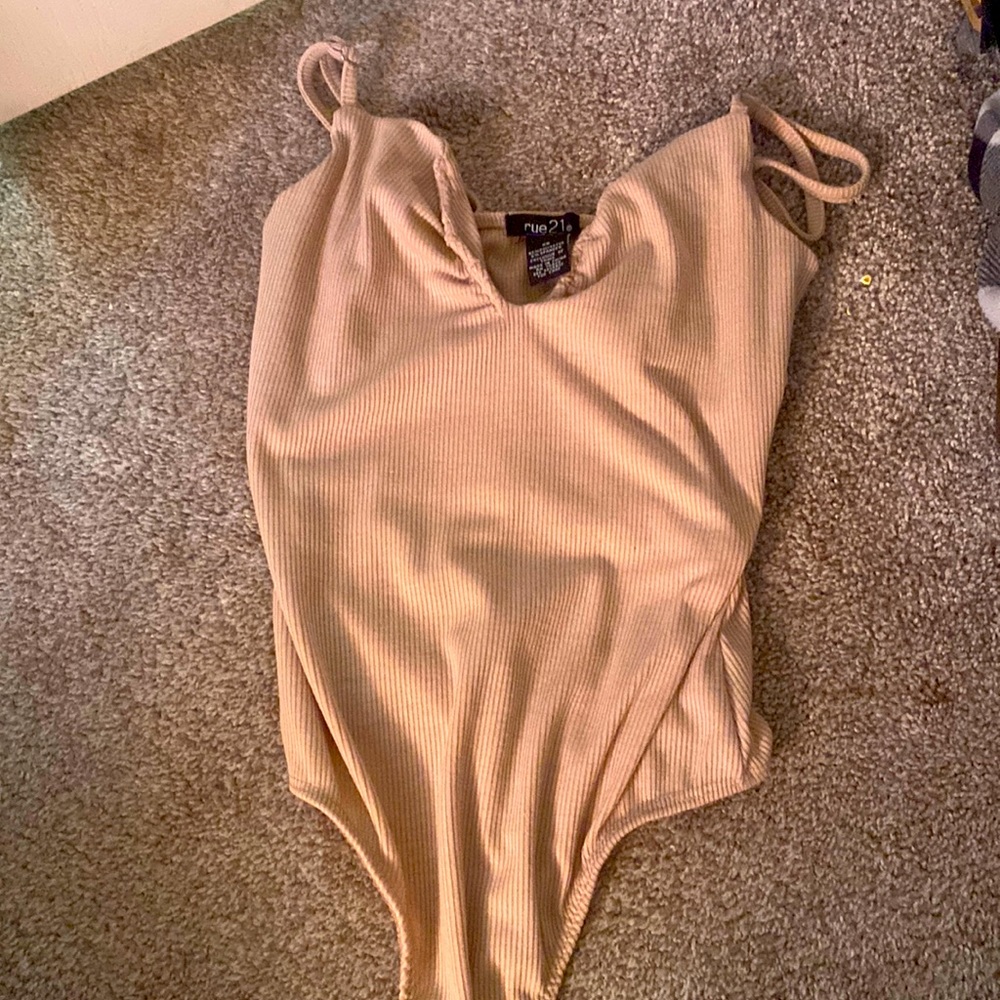 bodysuit, somewhat comfortable, stays in place